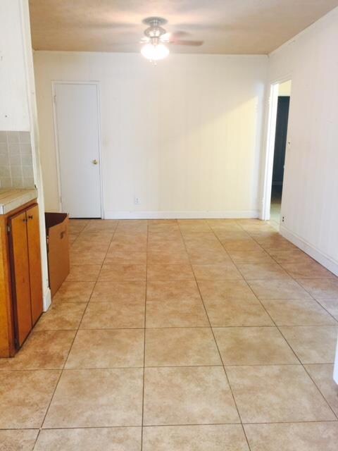View of dining area in kitchen when you enter from the side door of home.