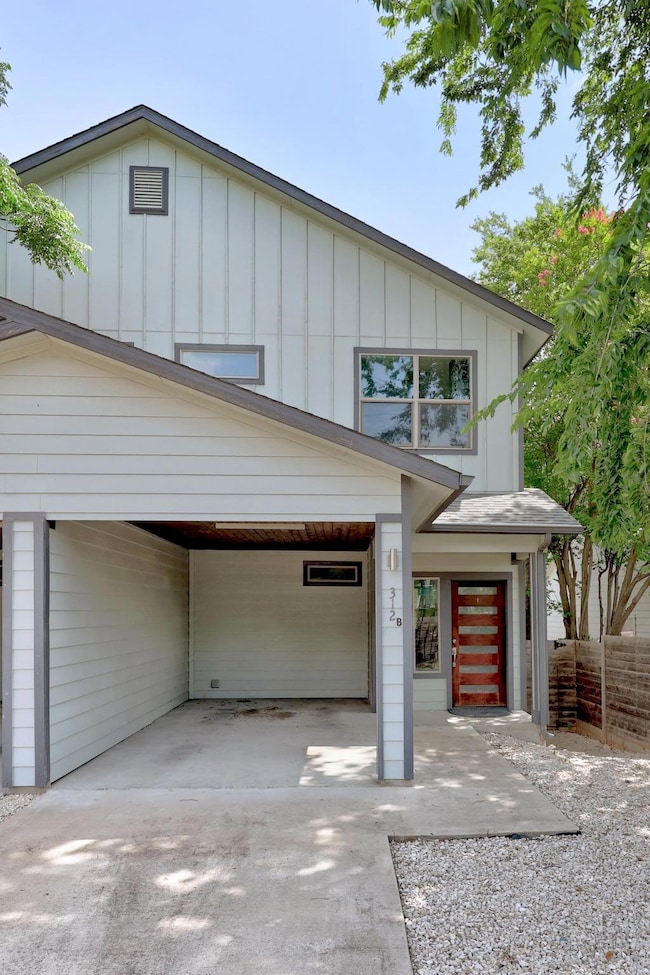 View of front of property featuring board and bat