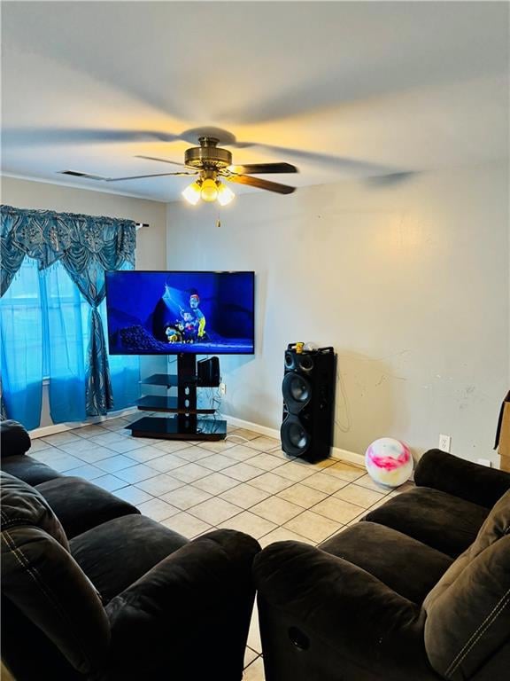 Living room with light tile patterned floors and a ceiling fan