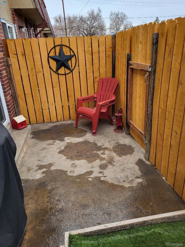 CUTE YARD WITH NEW FENCING