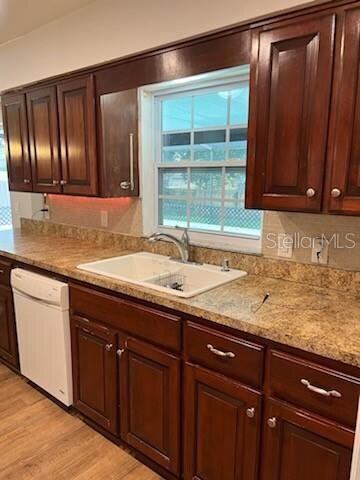 Kitchen offers view to the pool area out back - perfect for entertaining family and friends