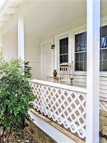 Cute front porch.  Note...new windows!