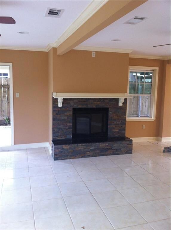 Fireplace in Den.