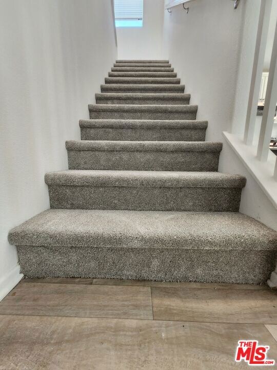 Staircase to upstairs living a