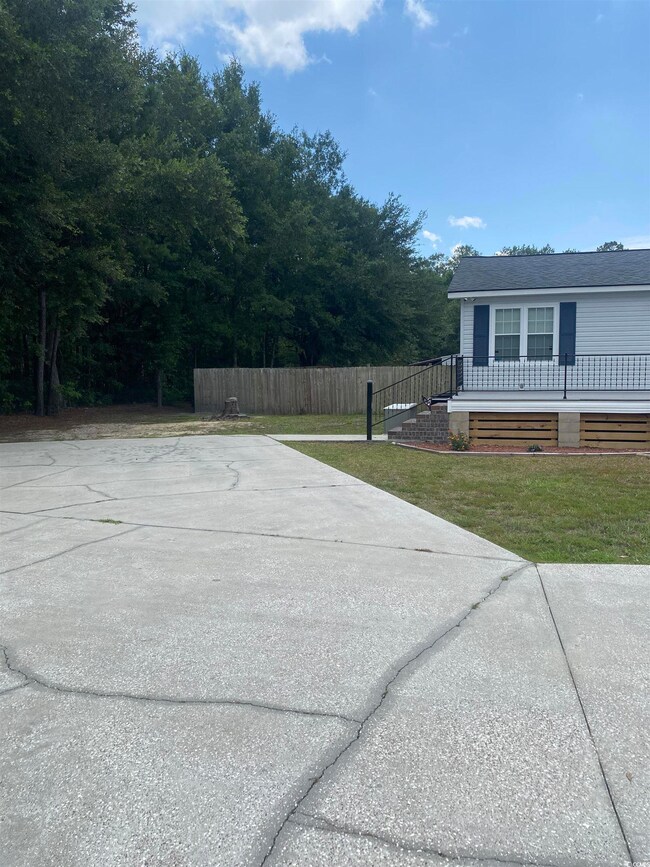 Exterior space with a yard