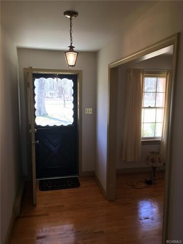 Foyer with an entrance to the living room.