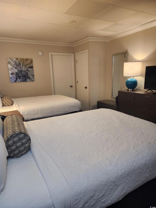 Bedroom featuring ornamental molding