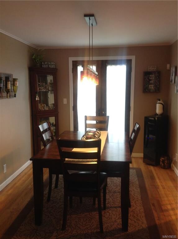Dining room with new French doors leading out to b