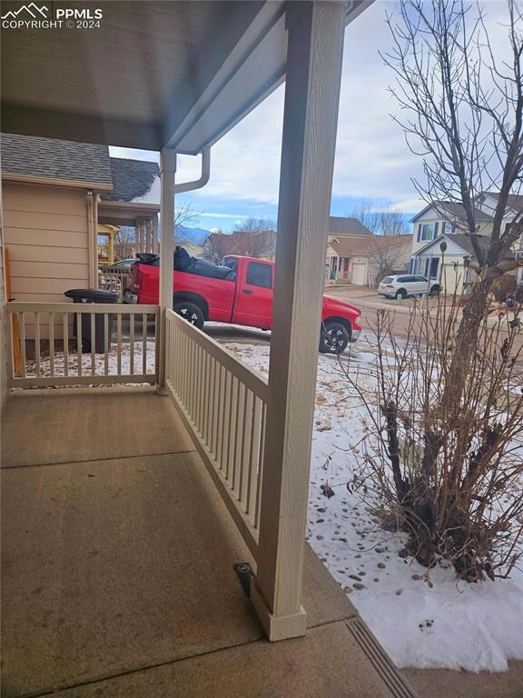 Front porch and view of neighborhood.