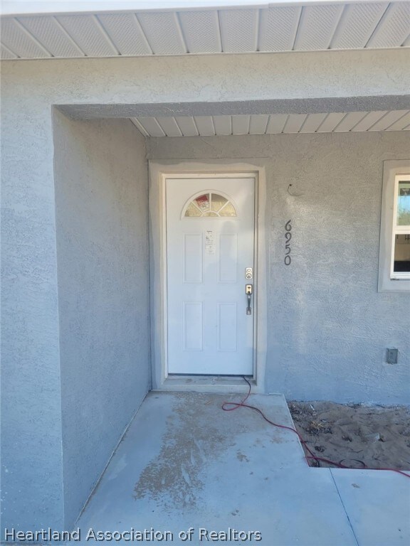 6950 San Benito Dr, Sebring, FL 33872 - photo 2