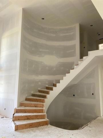 Signature Curved Stairwell to Loft area