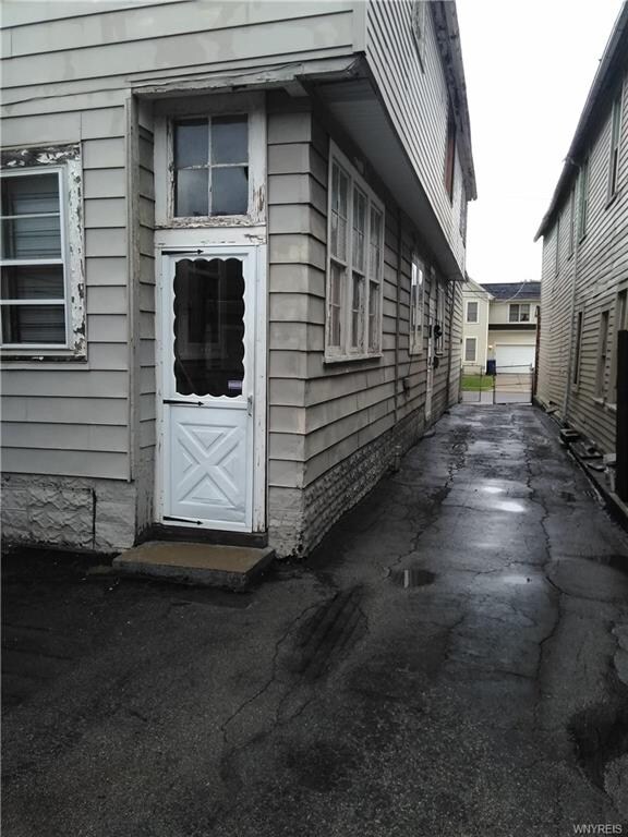 Back door with large driveway
