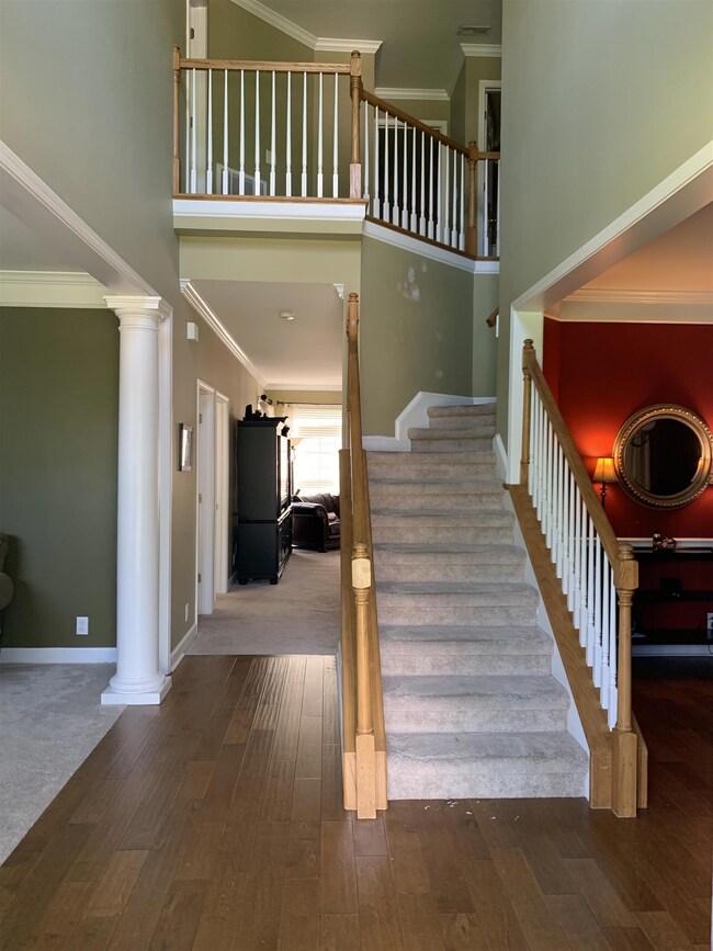Beautiful 2 story foyer with new hard wood flooring