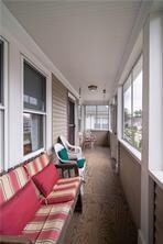 ENCLOSED FRONT PORCH