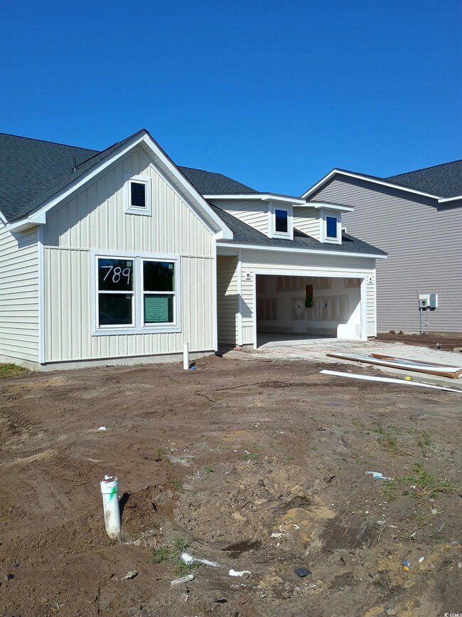 View of front of home with a garage