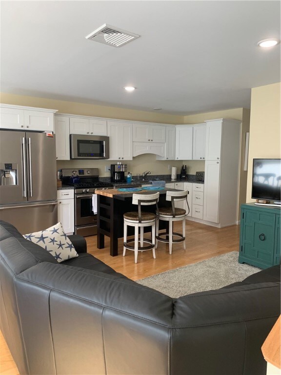 Open Floor Plan with Beautiful Hardwood Floors.