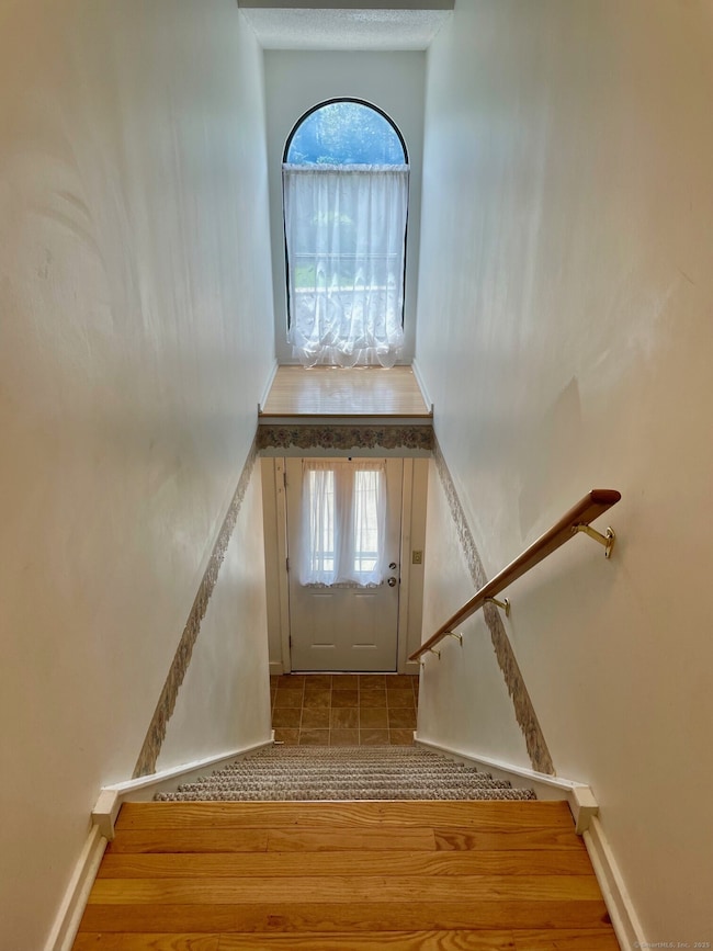 Enter up a flight of stairs
