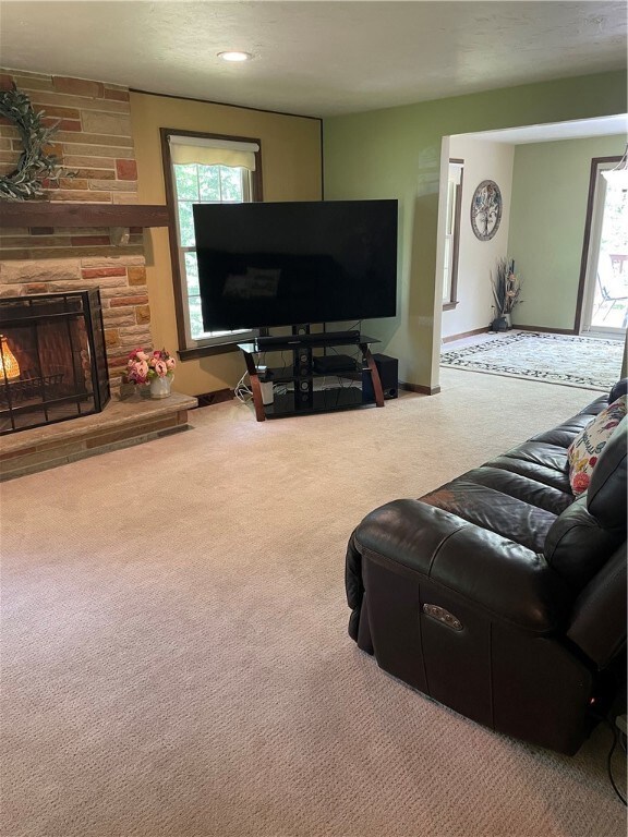 Get cozy in the roomy living room with a wood-burning, brick fireplace