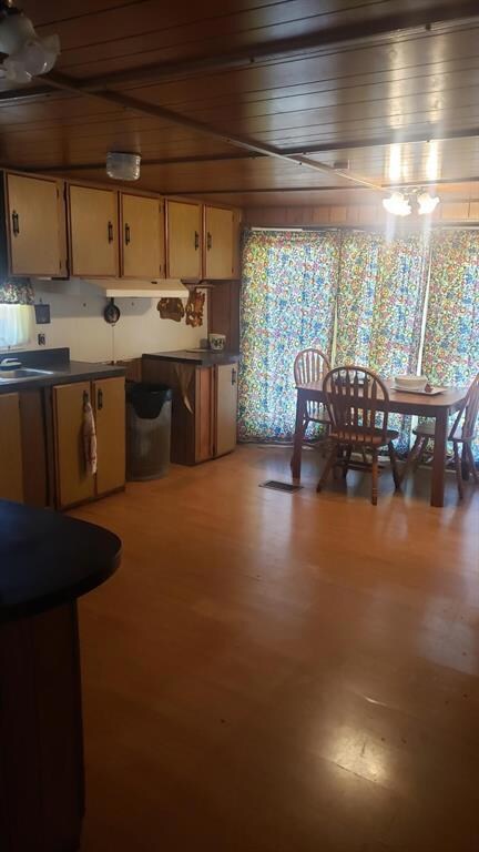 Dining room with light wood-style flooring