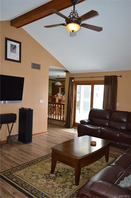 Family room leading to hallway and kitchen with al