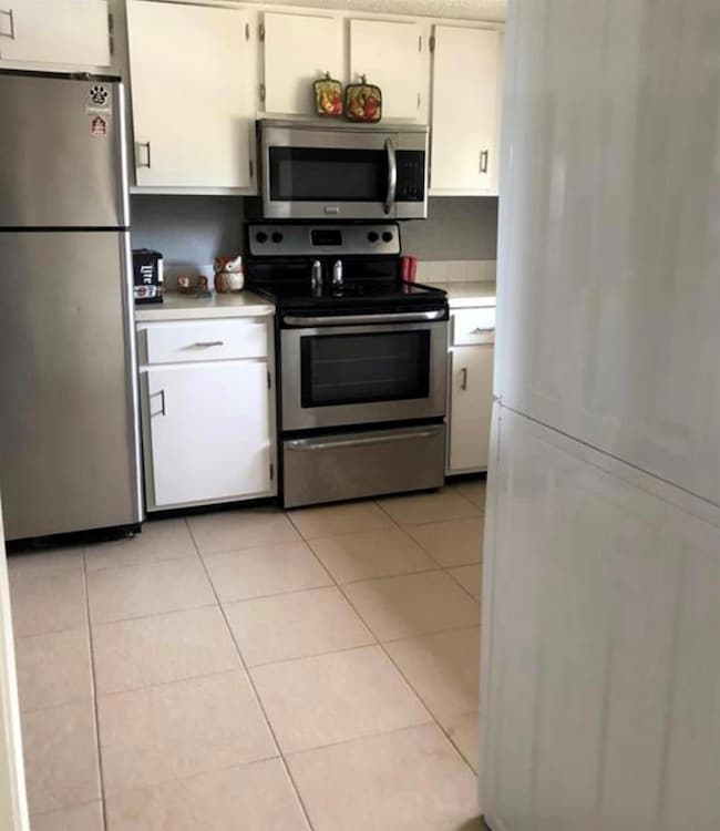 Kitchen featuring appliances with stainless steel 