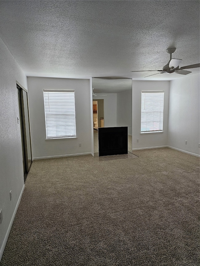 Large primary bedroom with fireplace