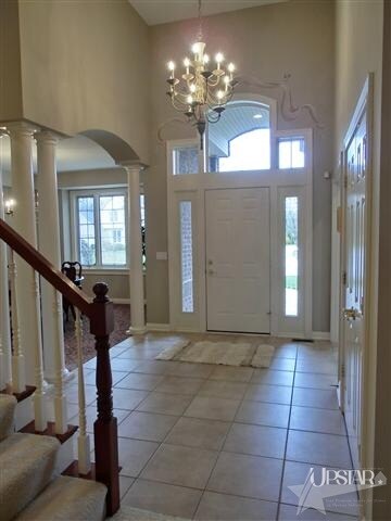 Volume ceilings throughout, tiled foyer