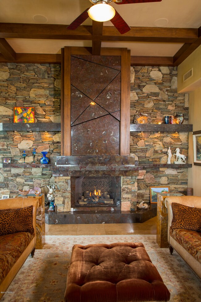 TV hidden above Fireplace