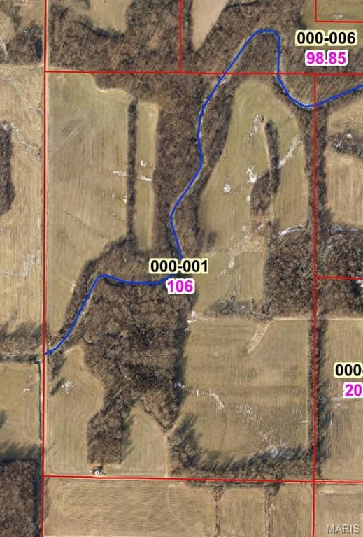 Aerial overview of property's location featuring property parcel outlined