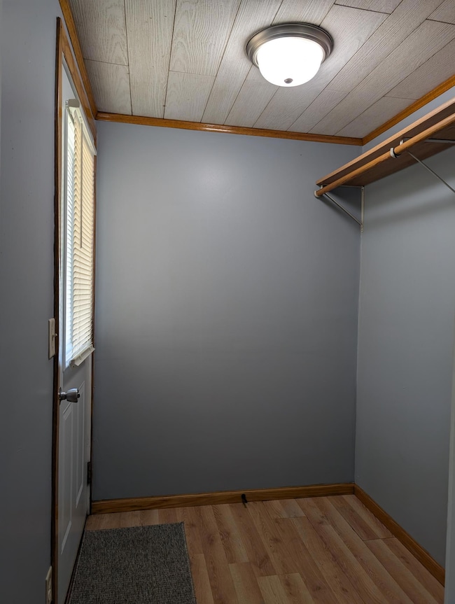 The side entry is a spacious foyer area.