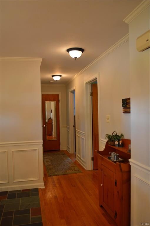 Hallway that leads to bedrooms and bathroom