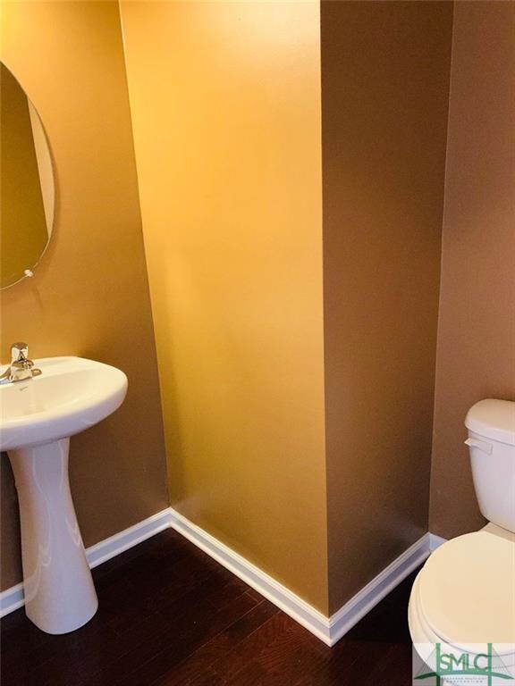 Half bath in the hallway