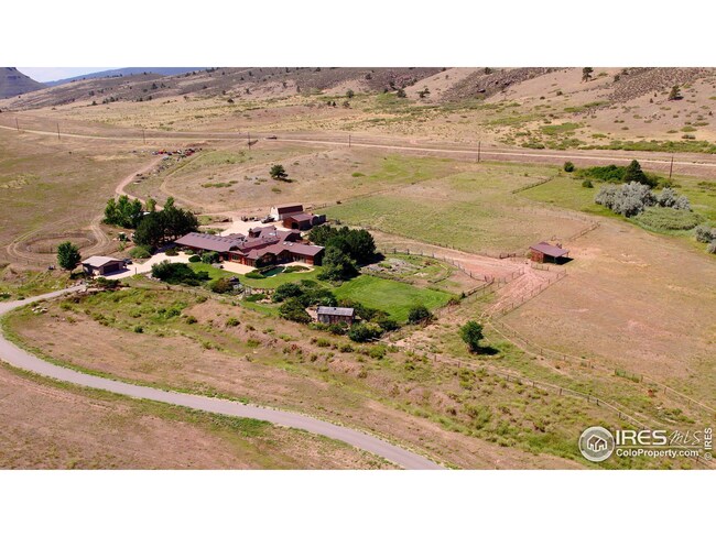 Aerial overview of the main house and all surrounding structures.