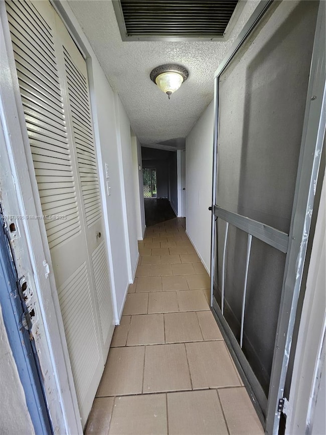 Entrance has a screened door as well