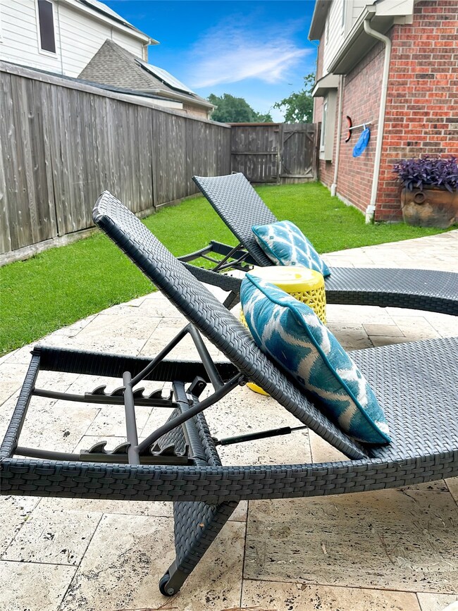 Plenty of side yard for dogs or a game of cornhole.