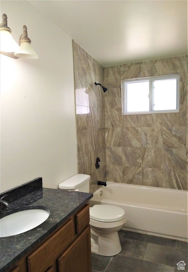 Full bathroom with vanity and  shower combination
