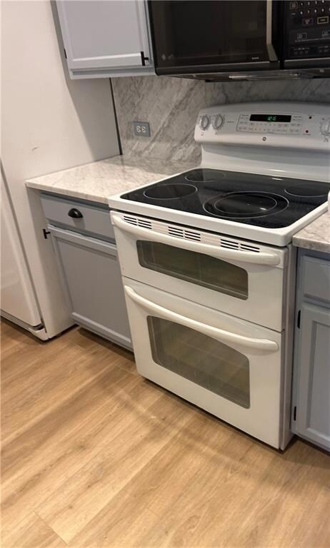 Kitchen featuring light hardwood / wood-style floo