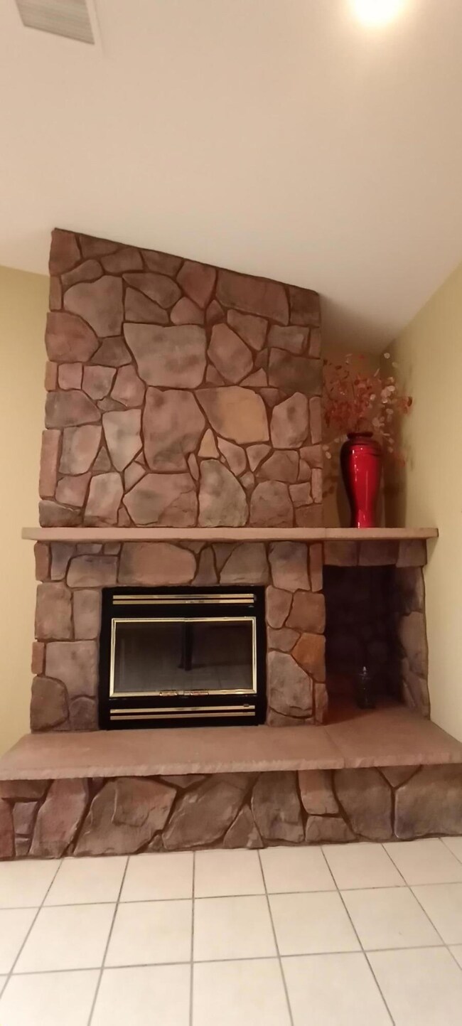 Stone Fireplace w Heater Fan