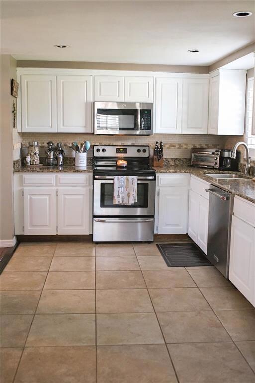 2627 Wilson Cir, Lutz, FL 33548 - photo 7