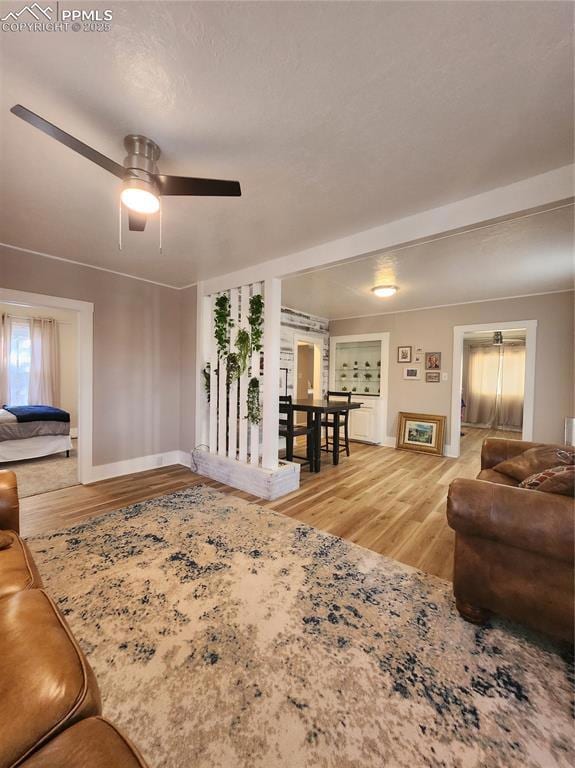 Living area featuring light wood-type flooring, a 