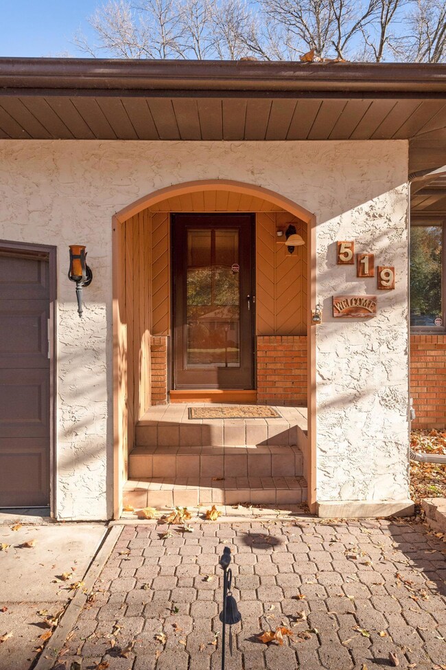 Lovely entry area features new front door!