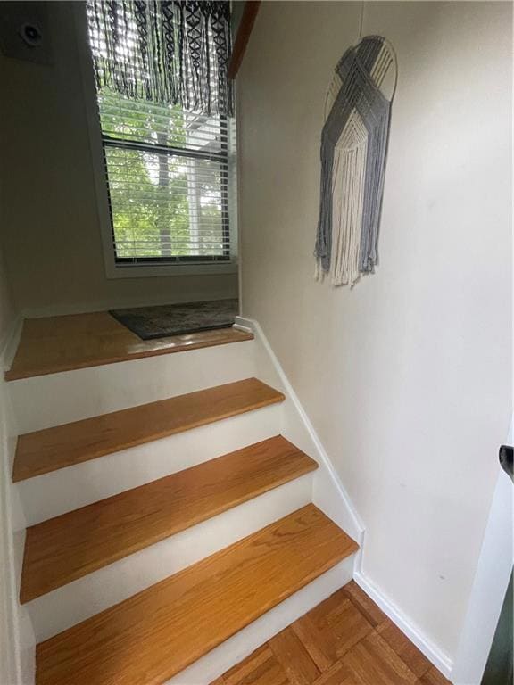 Stairs featuring baseboards
