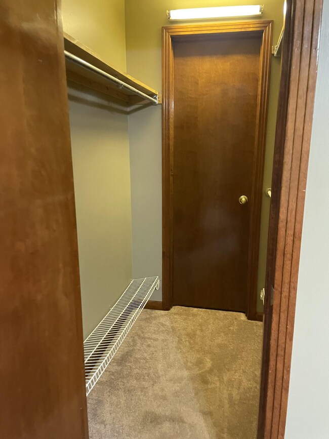 Closet that is shared with primary bedroom and  1st bedroom 