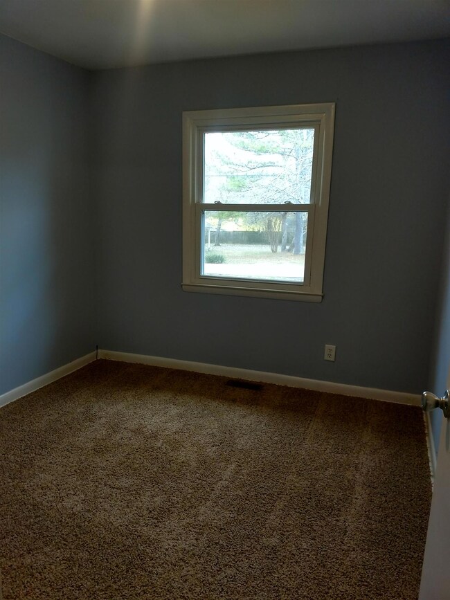 2nd bedroom with new carpet
