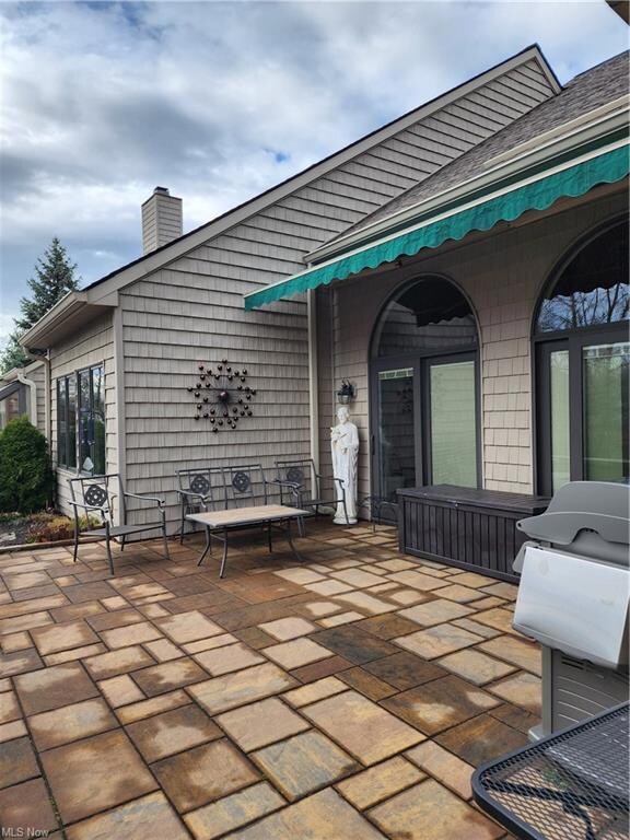 Back Stone Patio with retractable awning
