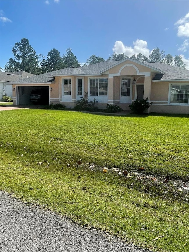 2 Unity Ct, Palm Coast, FL 32164 - photo 2