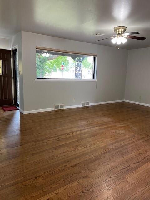Huge living area with wood floors