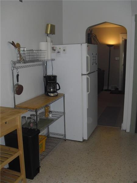 All the appliances stay including the baker's rack