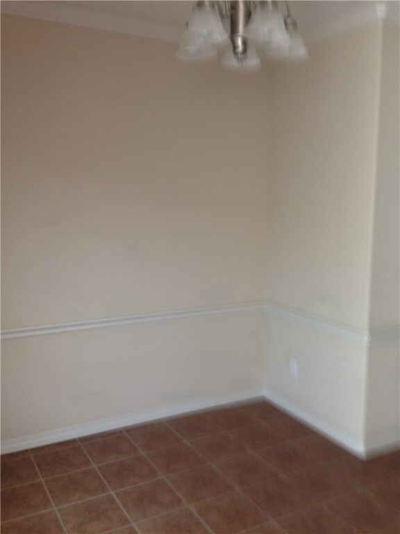 View of tiled spare room