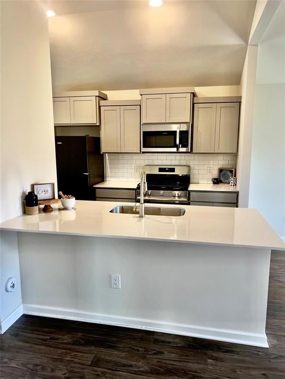 Kitchen with sink, dark hardwood / wood-style floo